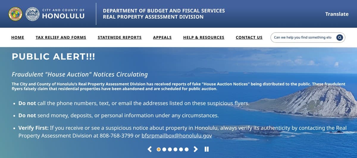 The City Real Property Assessment Division home page with a public alert about fraudulent House Auction notices, telling readers not to call, text or send money and to verify at 808-768-3799