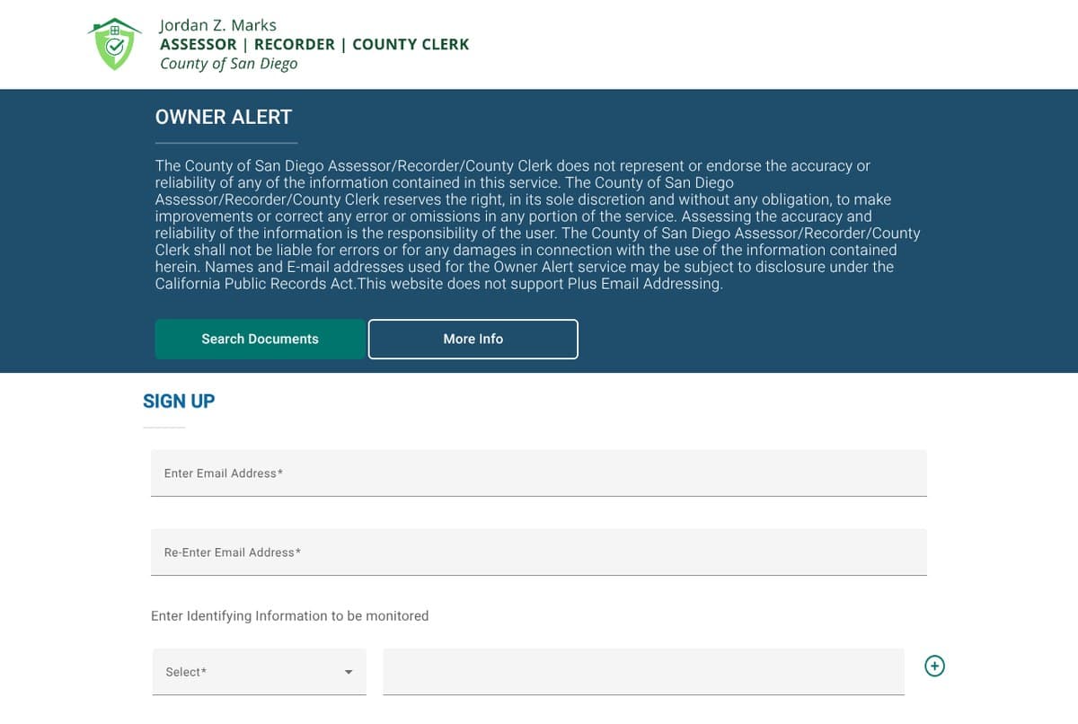 The County of San Diego Owner Alert sign-up page, with a disclaimer, Search Documents and More Info buttons, two email address boxes and a Select menu for the name or parcel number to watch