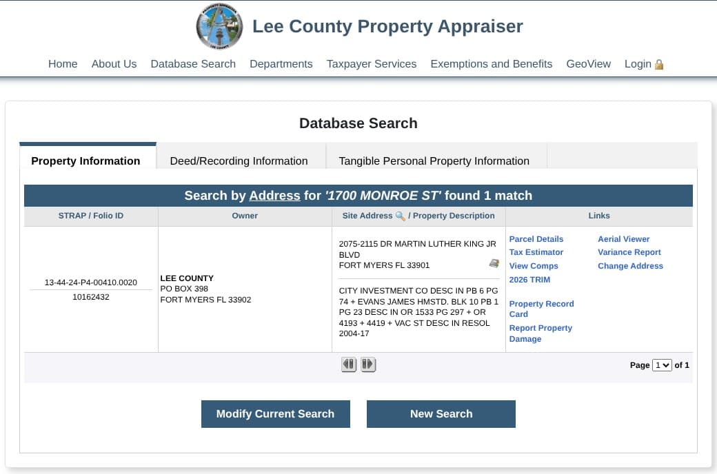 Property Appraiser search result for a county-owned parcel, showing its STRAP number, Folio ID, owner Lee County, mailing address and links such as Change Address.